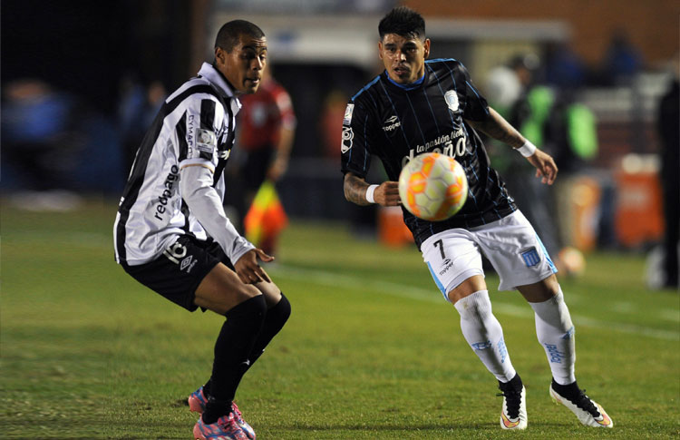 Montevideo, Uruguay. 7th May, 2015. Brian Fernandez (R) of Argentina's Racing  Club, celebrates after scoring against Uruguay's Wanderers, during the  first leg match of the Libertadores Cup round of 16, at Gran